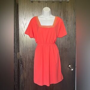 Coral shortsleeved medium dress, beaded neckline